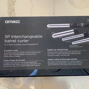 Amika interchangeable 5p barrel curler. Lightly used still in box.